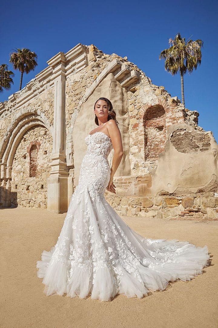 Picture of Cassablanca dress on bride outside stone ruins