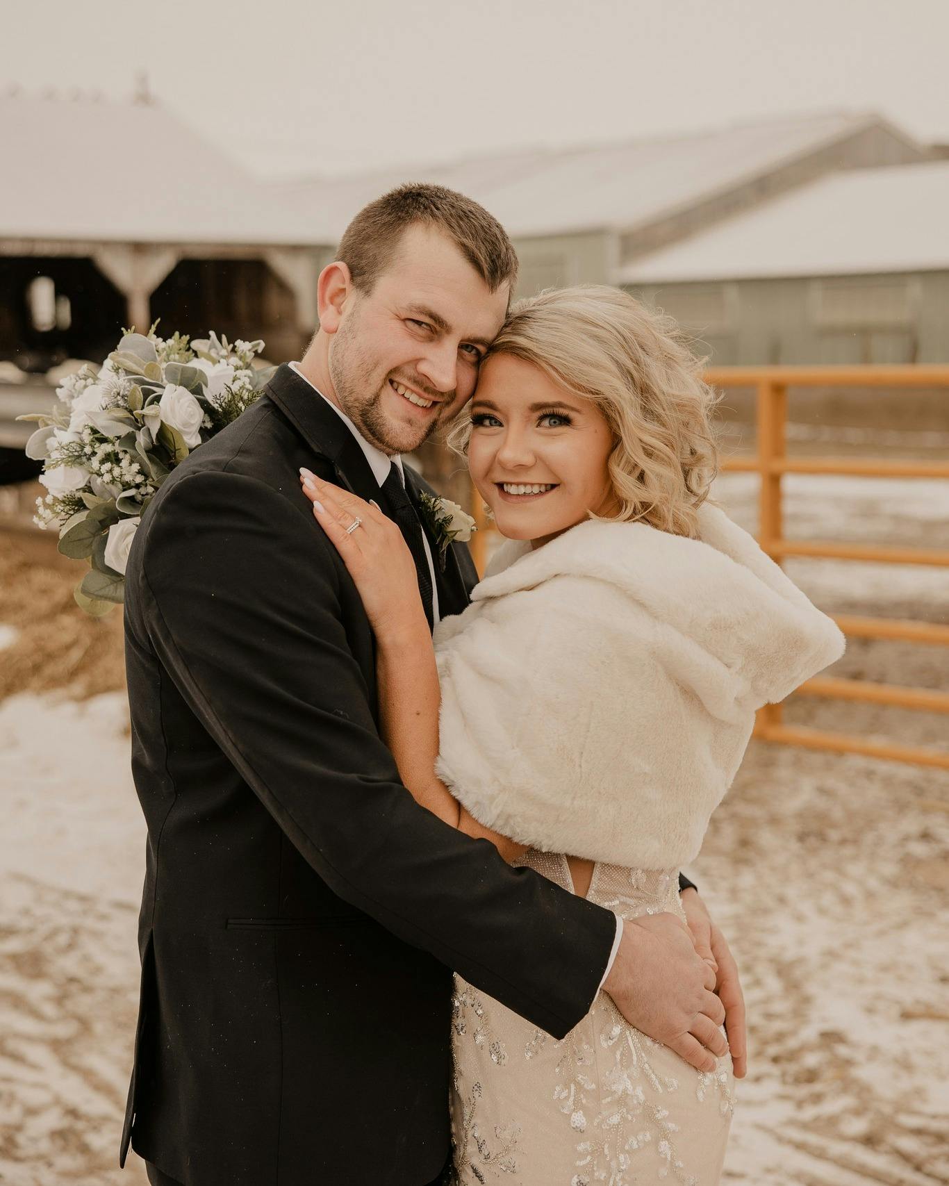 Picture of Bride and groom smiling on a ranch